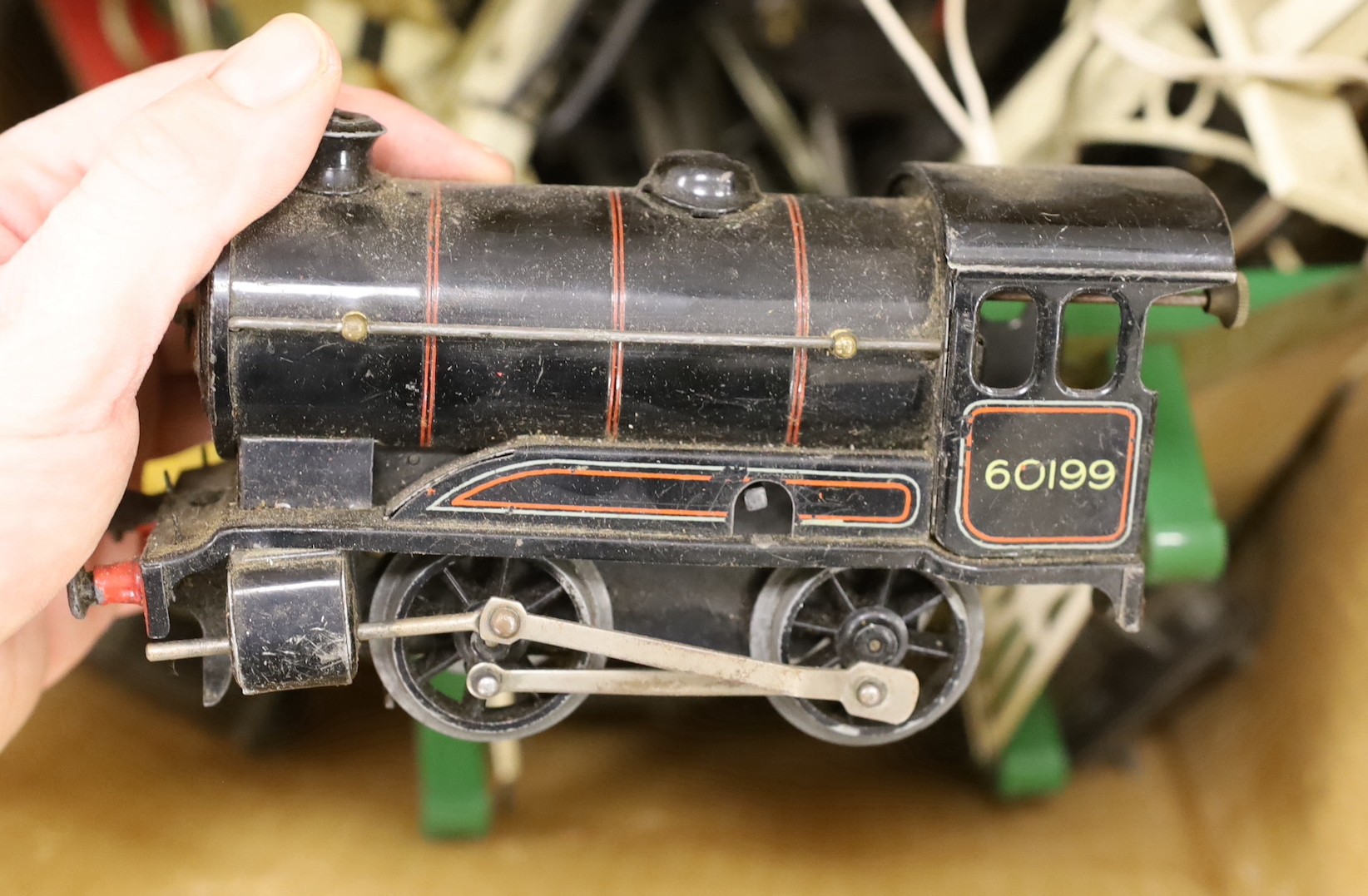 A Dublo Hornby locomotive, a quantity of tack etc and a Walt Disney made in Britain tin windup toy of Mickey Mouse and Donald Duck